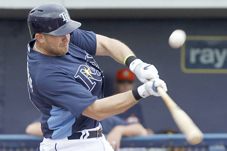 Evan Longoria hits a first inning single Tuesday in the Rays' spring training game against a split Astros squad in Port Charlotte.