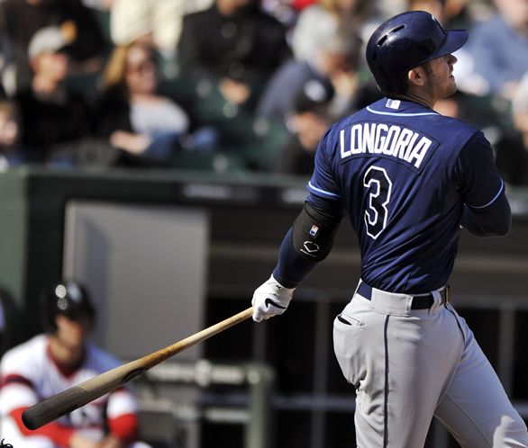 Evan Longoria pads the Rays’ lead to 8-3 with a ninth-inning double off White Sox reliever Deunte Heath that lands just inside the foul line in left and brings in Matt Joyce from third base. (Photo courtesy of the Associated Press)