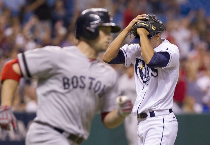 Chris Archer buries his head in his hands after giving up a two-run homer to Boston’s Daniel Nava in the third inning. (Photo courtesy of James Borchuck/Tampa Bay Times)