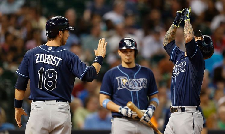 Ryan Roberts is congratulated by Ben Zobrist after hitting a two-run homer in the third inning. (Photo courtesy of Getty Images)
