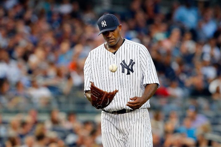 CC Sabathia tosses the ball after surrendering a run in the second inning against the Tampa Bay Rays. (Photo by Jim McIsaac/Getty Images)