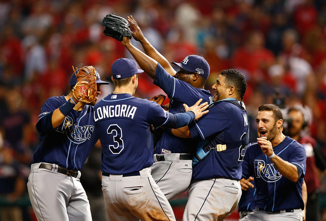 Evan Longoria joins the celebration around Fernando Rodney after beating the Cleveland Indians. (Photo courtesy of Jared Wickerham/Getty Images)