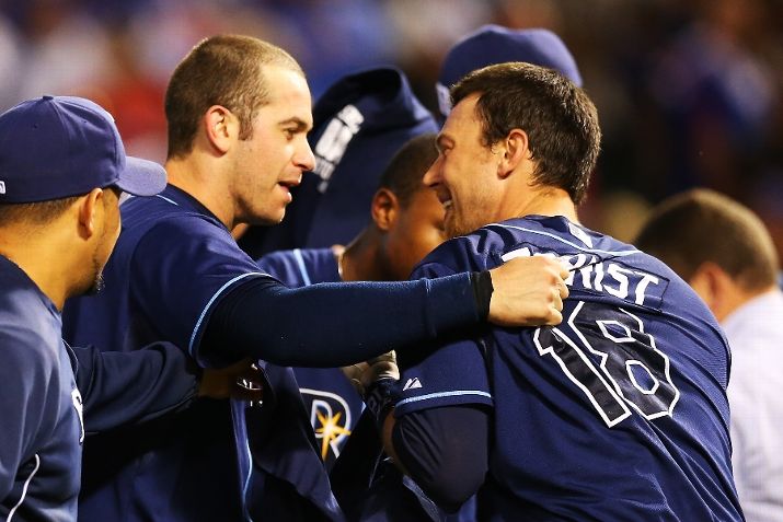 Evan Longoria and Ben Zobrist celebrate their 5-2 win over the Texas Rangers in the American League Wild Card tiebreaker game. (Photo by Ronald Martinez/Getty Images)