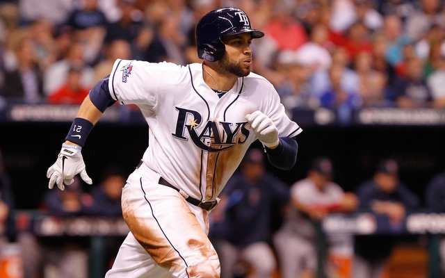 Tampa Bay Rays first baseman James Loney (21) singles during the fourth inning against the Boston Red Sox of game three of the American League divisional series at Tropicana Field. (Photo courtesy of Kim Klement/USA Today Sports)
