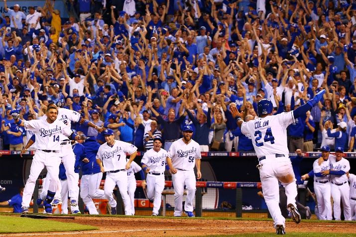 The Kansas City Royals celebrate their 9 to 8 win over the Oakland Athletics in the 12th inning of the American League Wild Card. (Photo courtesy of Dilip Vishwanat/Getty Images)