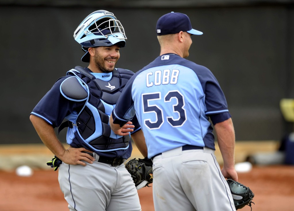 Rays ace Alex Cobb and catcher Rene Rivera share a laugh on the first day of Spring Training. (Photo courtesy of TBO.com)