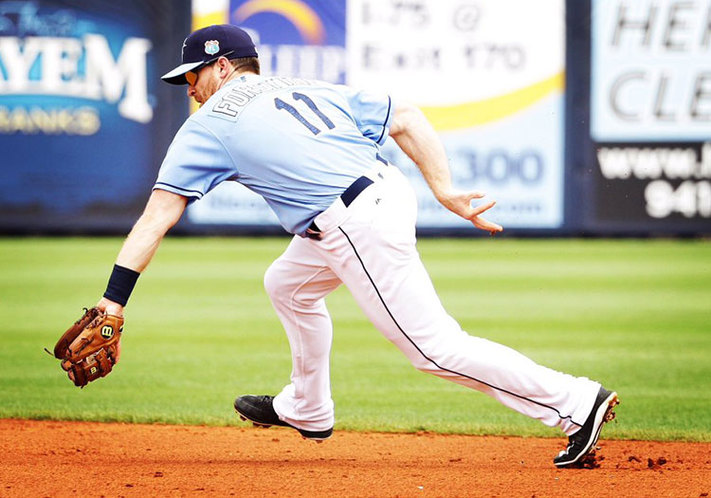 Logan Forsythe ranges to his right to field a grounder against the Twins on Friday. (Photo Credit: Tampa Bay Times)