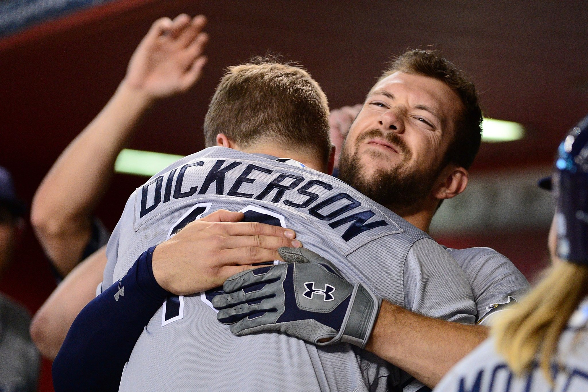 Corey Dickerson, enveloped by Steven Souza Jr., hit two homers in the series finale against the Arizona Diamondbacks. (Photo Credit: Tampa Bay Rays)